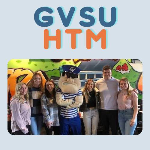 HTM Club students and Louie the Laker mascot